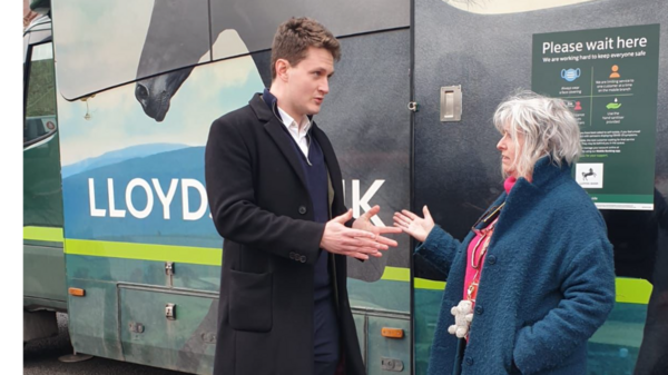 David talking in front of Lloyds